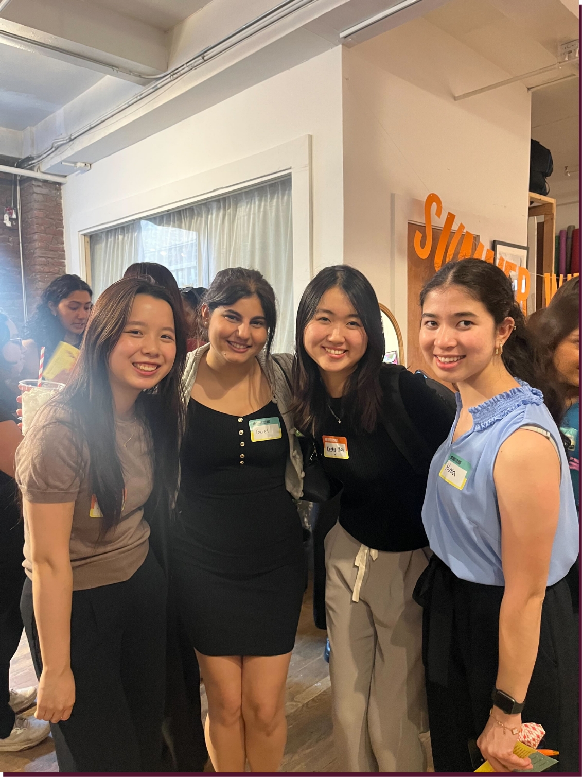 Group of four women smiling at a Rewriting the Code event