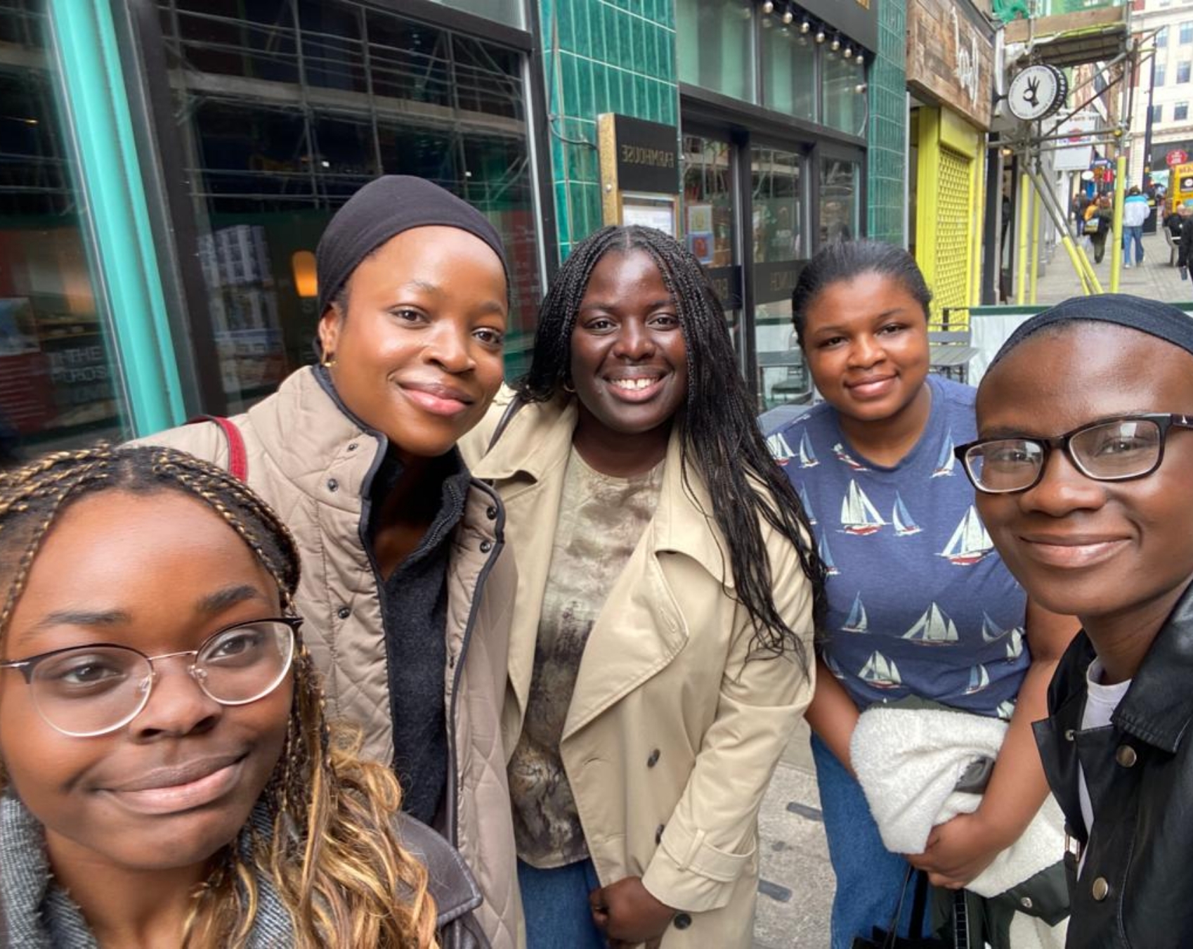 Group of Rewriting the Code members smiling