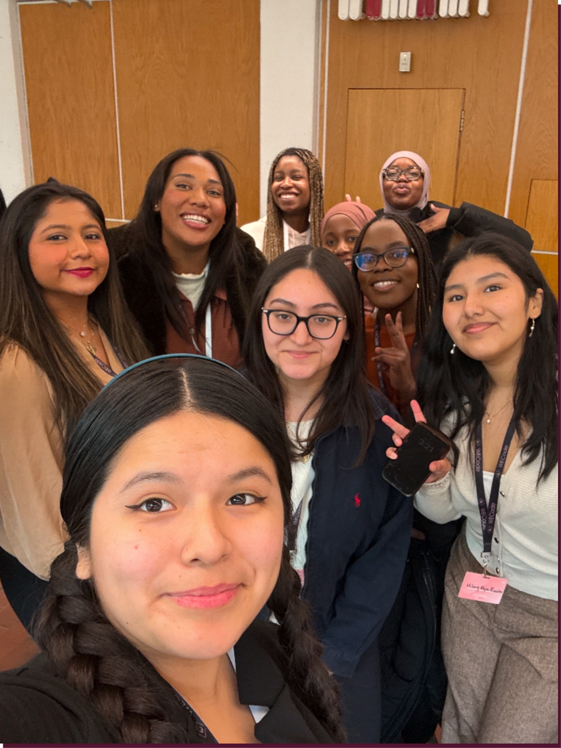 Group of nine women smiling in a selfie at a Rewriting the Cod event