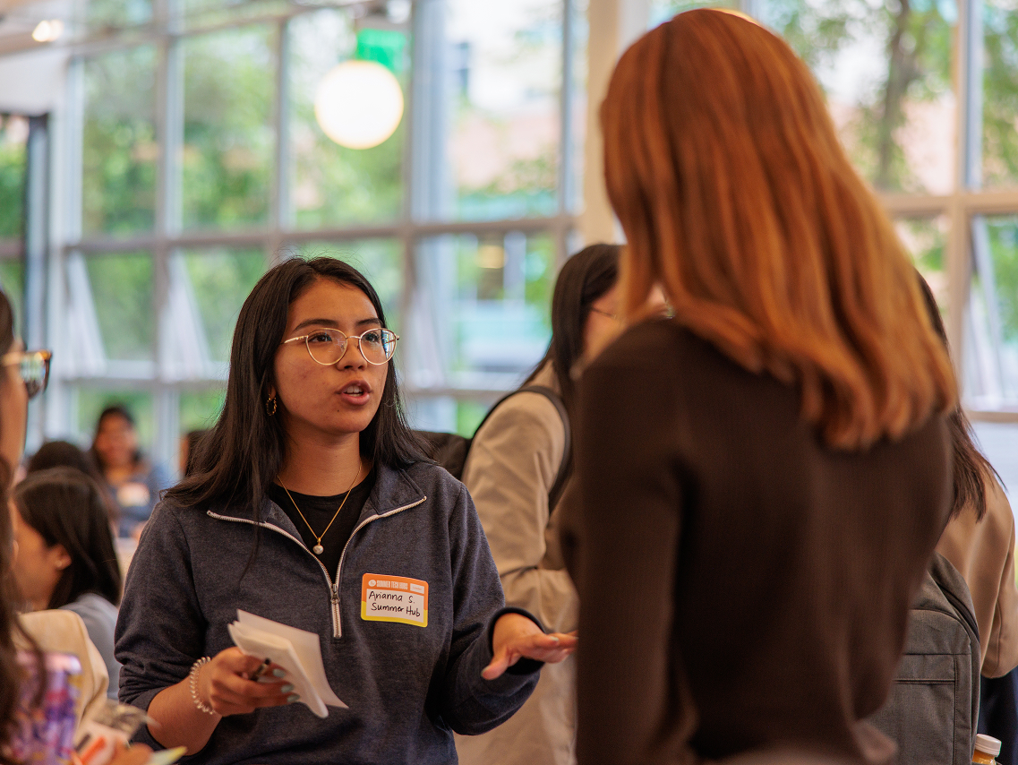 RTC member speaking with another person