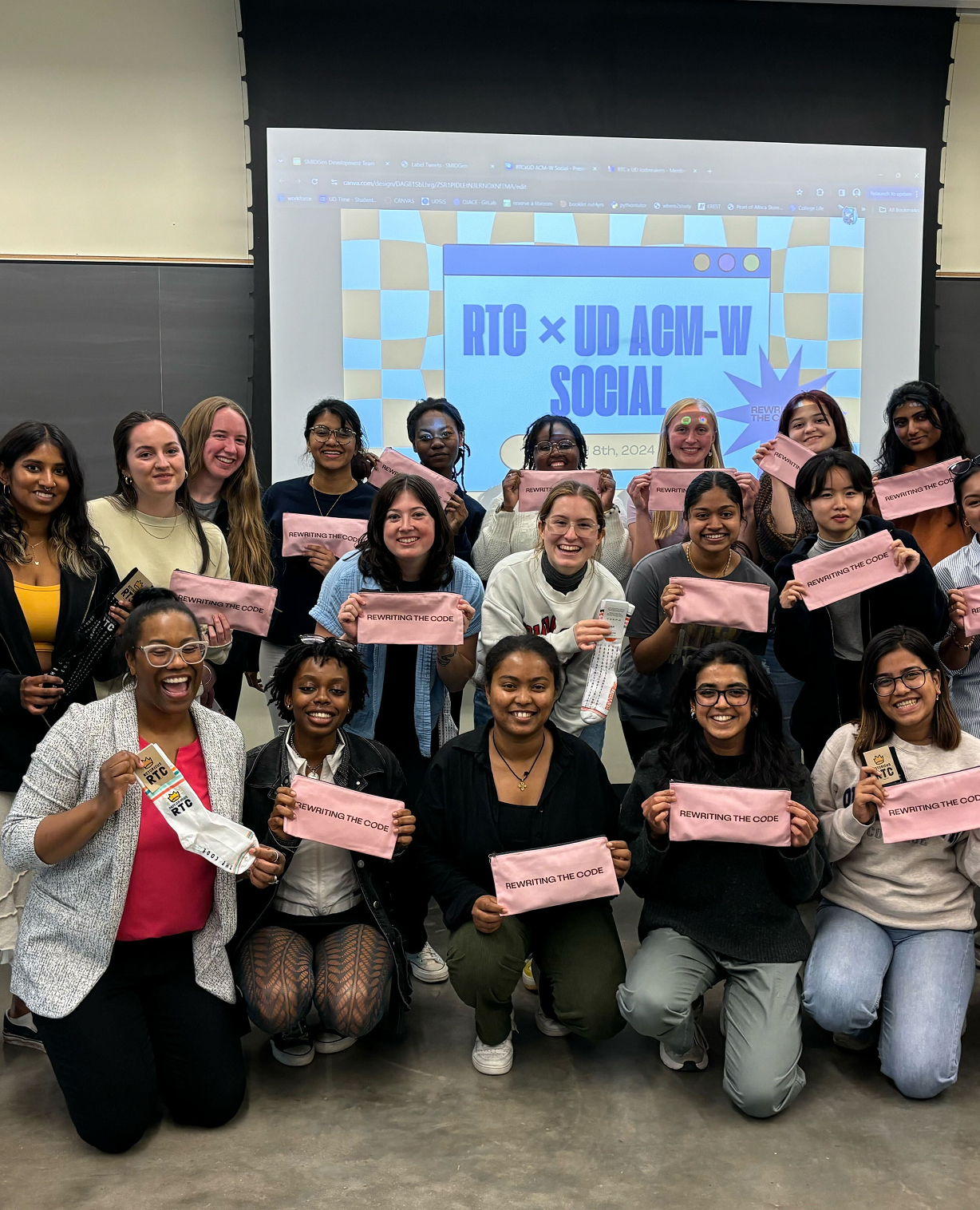 group of women smiling and holding RTC swag