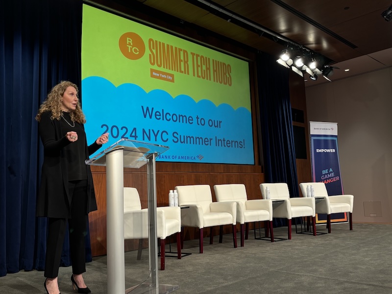 RTC summer tech hubs powerpoint and a woman speaking