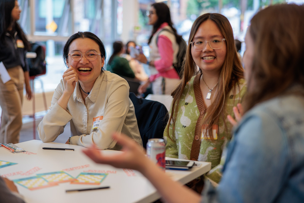 members smiling and talking