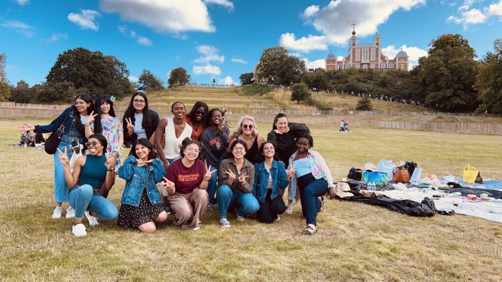 rewriting the code members smiling and happy