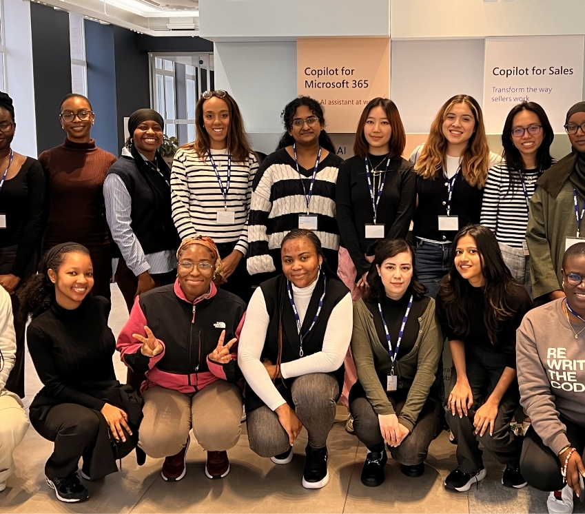 women smiling at a camera at a RTC UK&I event