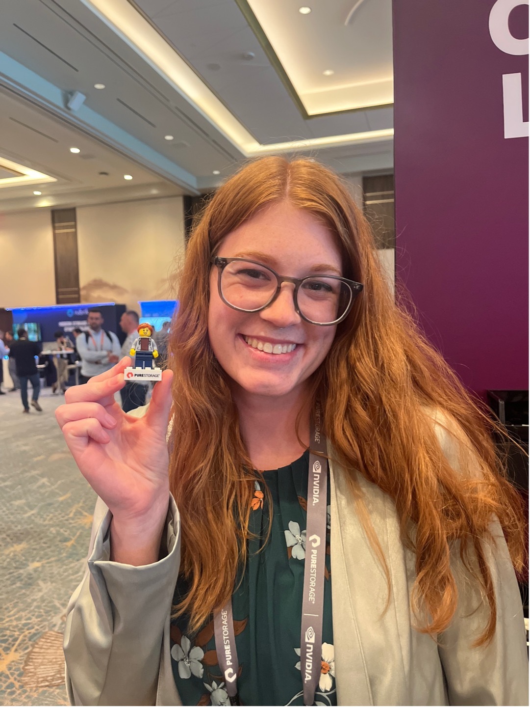 Lauren holding a Lego Minifig